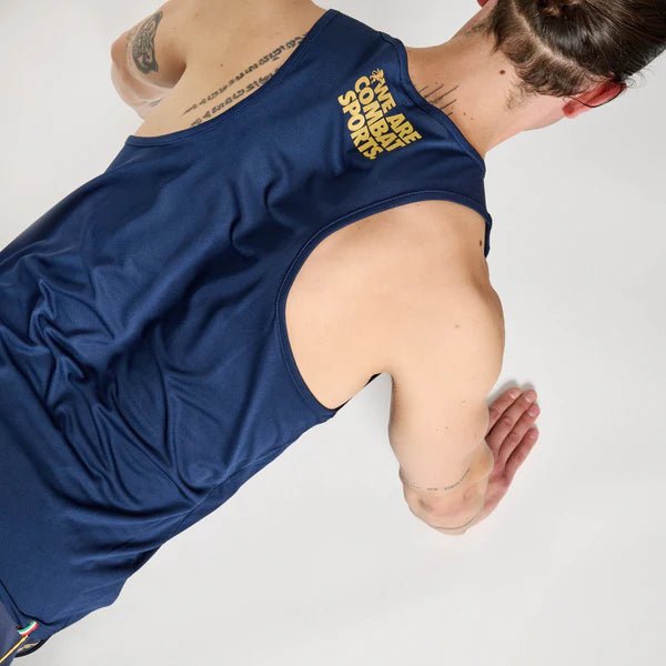 Macro detail of the breathable micro-perforation in the blue variant of the DNA tank top