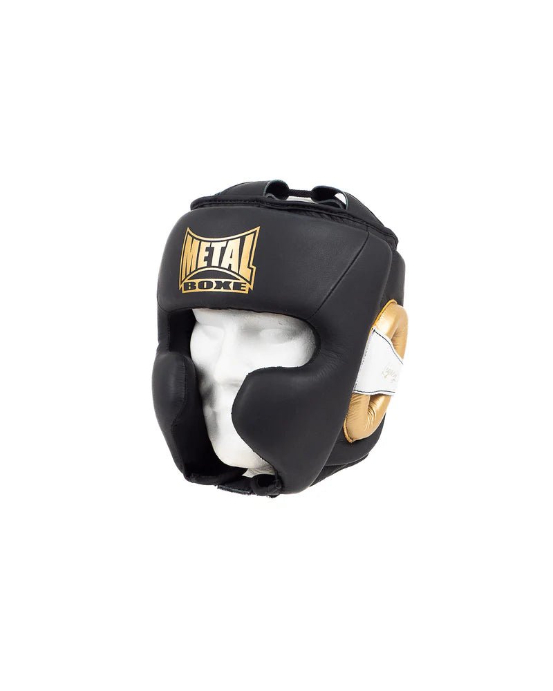 Front view of the Metal Boxing Legacy helmet in black and gold leather, professional design