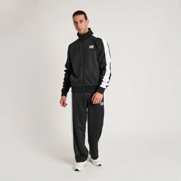 Conjunto de agasalho técnico masculino Leone com jaqueta de gola alta e calça esportiva preta