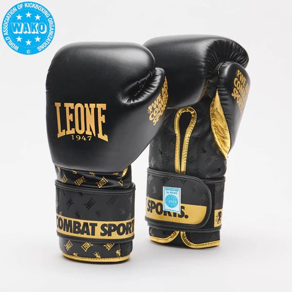 Pair of DNA Leone 1947 black and gold WAKO Approved gloves positioned in front