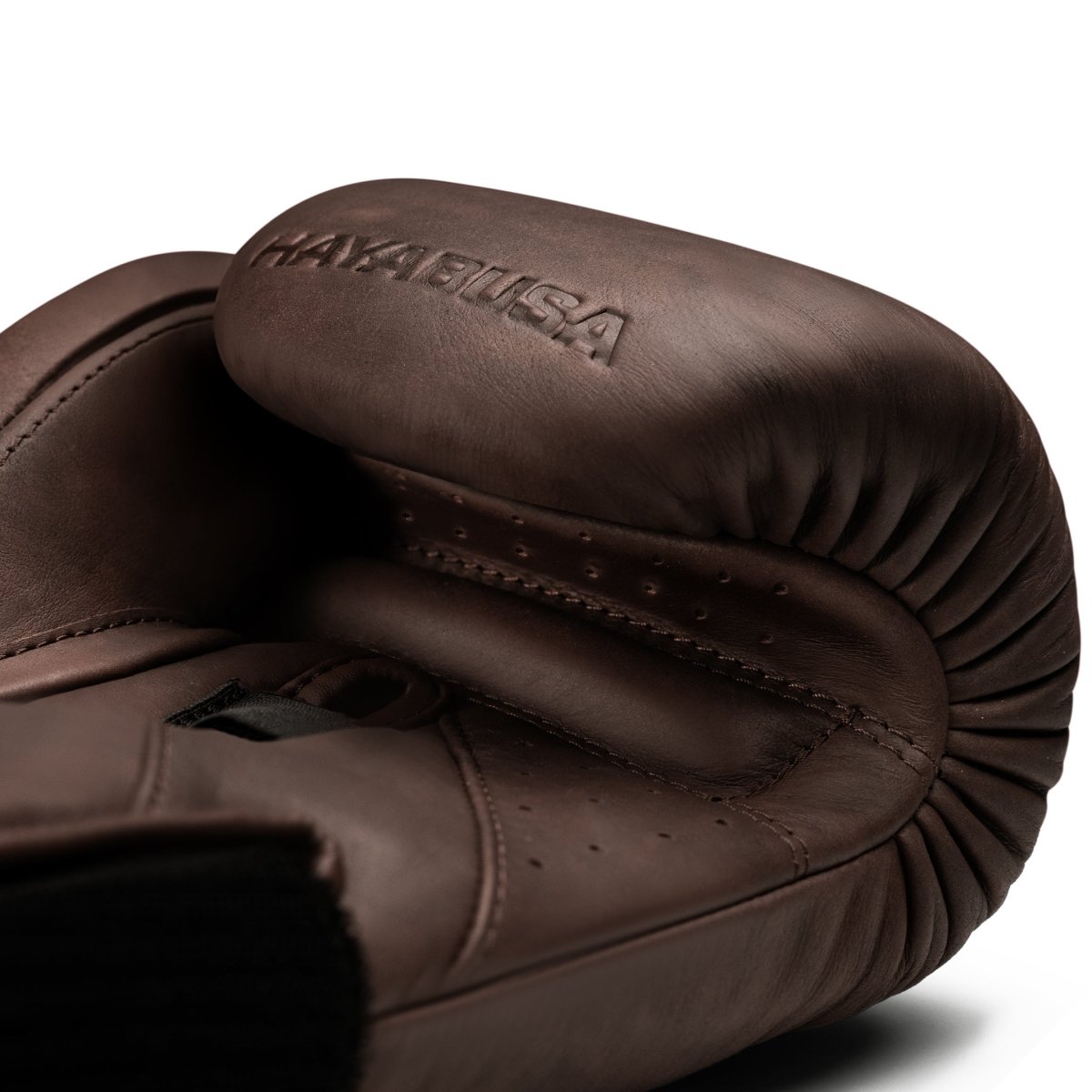 Detail of the palm of the brown Hayabusa T360 gloves, highlighting the protection and multi-density padding