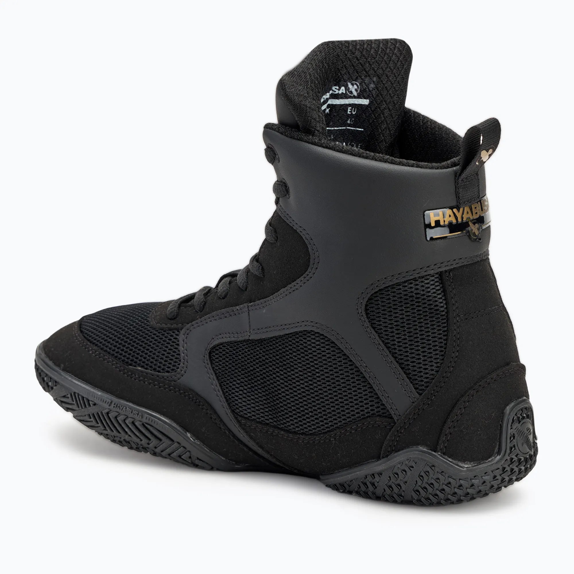 Design tecnico scarpe da boxe Hayabusa Pro nere e oro profilo.