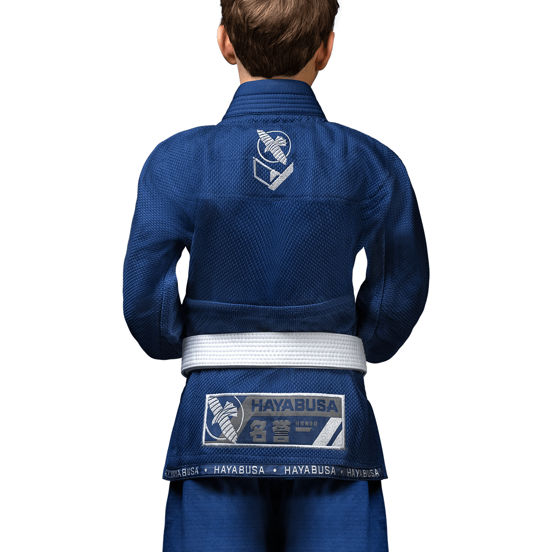 Vista posterior de los pantalones antidesgarros Hayabusa Gi y la chaqueta azul marino