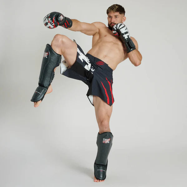 Pantalones cortos de artes marciales mixtas Leone Instinto Primal Gran Logotipo