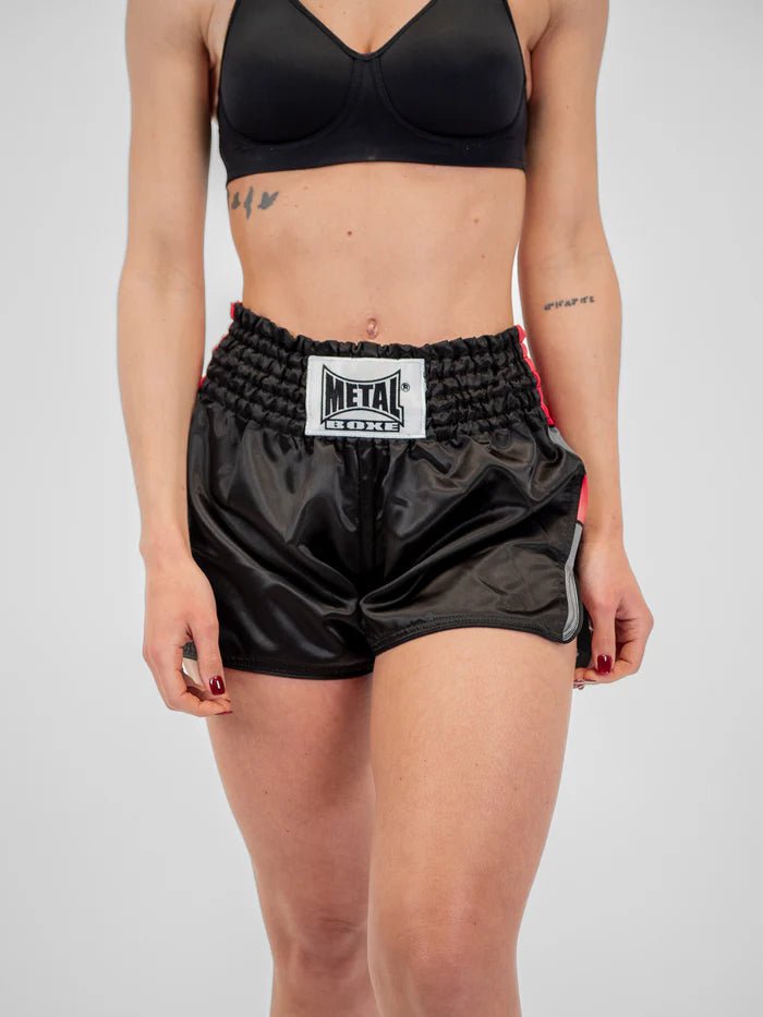 Front view black Kickboxing and Muay Thai Metal Boxe Kick Pro shorts worn by women