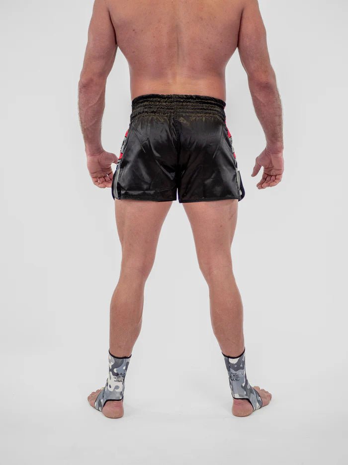 Vista posterior Kick Pro Metal Boxing shorts hombres ajuste profesional para ring
