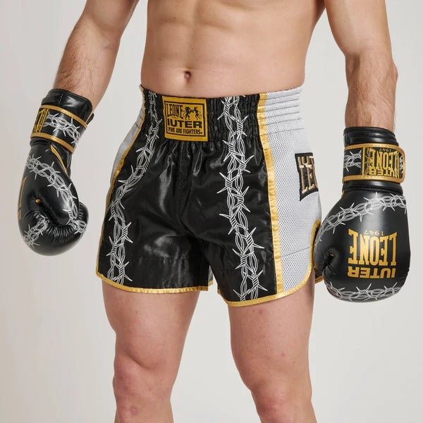 LEONE x IUTER shorts worn with coordinated gloves from the Barbed Wire collection