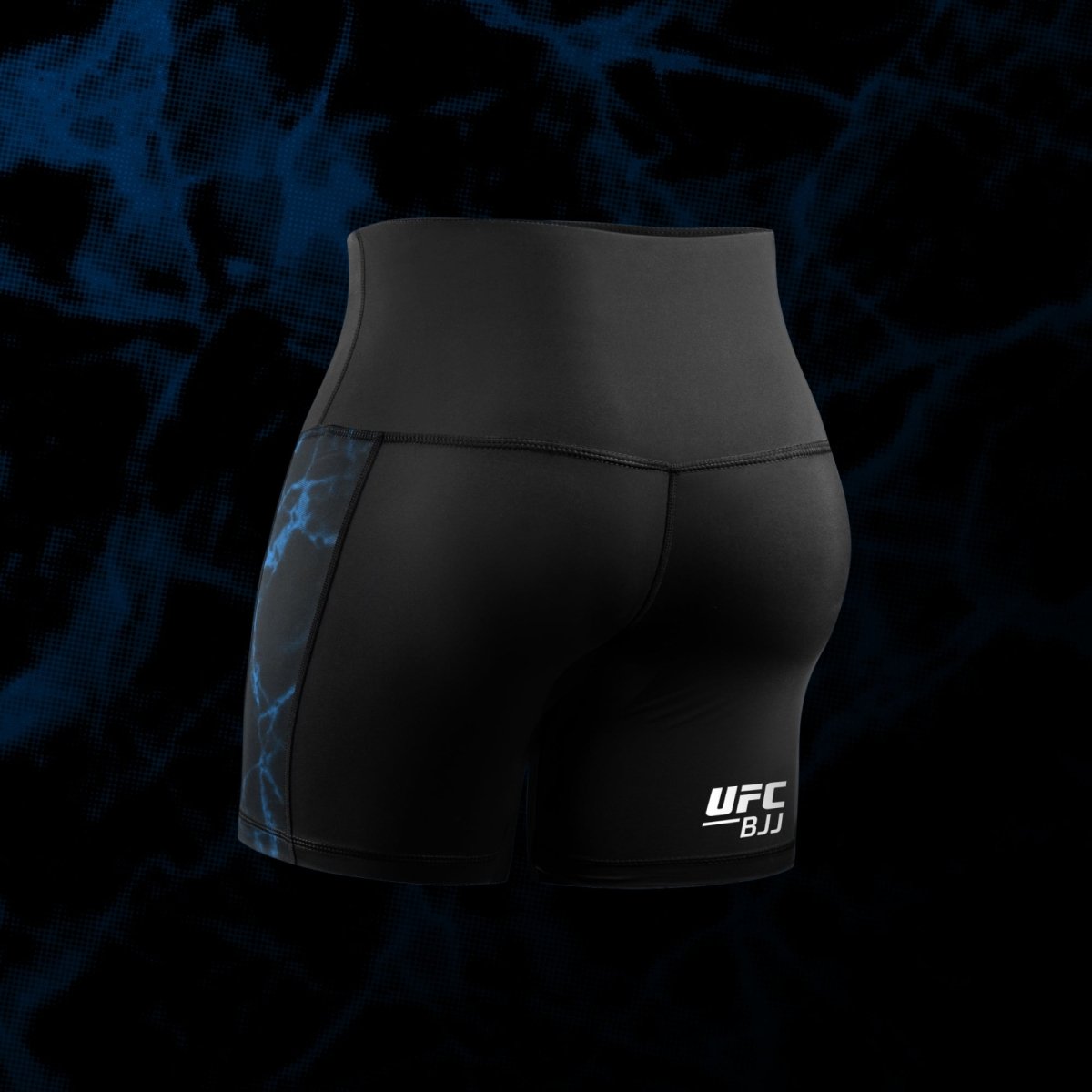 Vista trasera del pantalón corto de mujer Vale Tudo UFC negro y azul con elástico de silicona