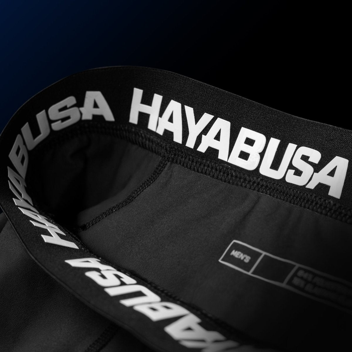 Detalle del cierre y forro interno de silicona del pantalón corto UFC BJJ azul