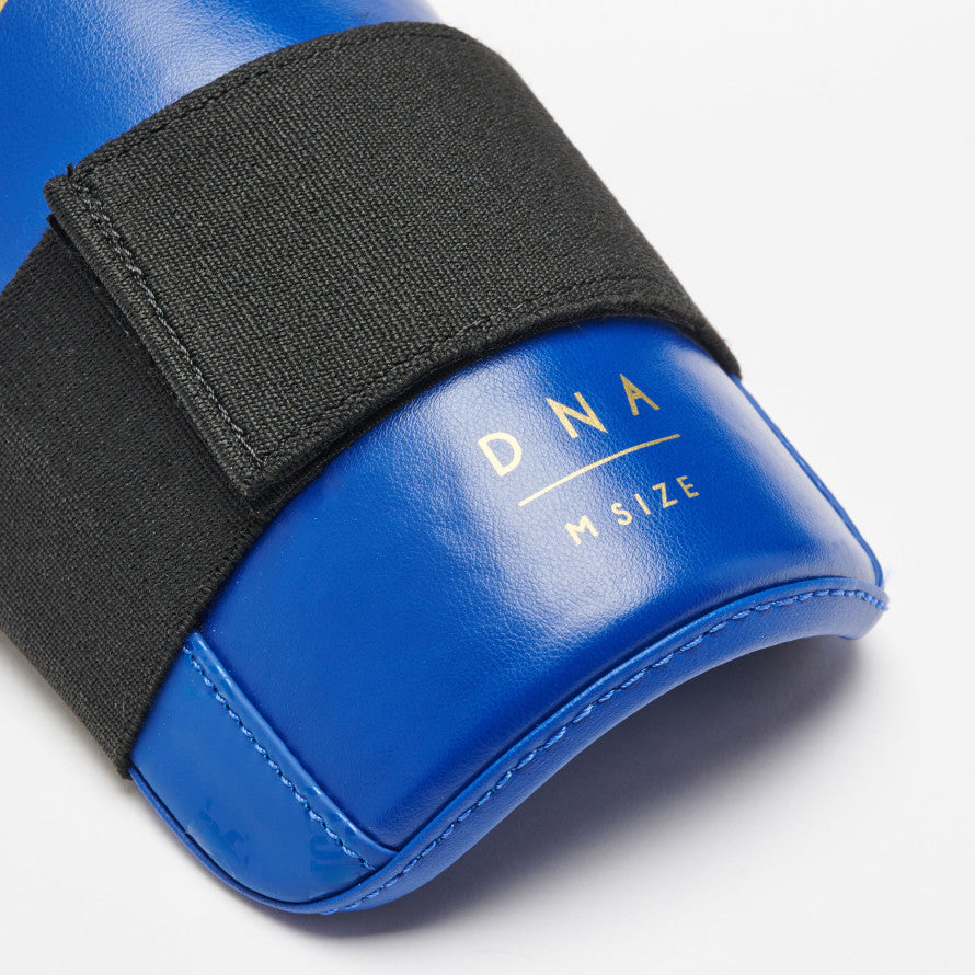 Espinillera de contacto completo para boxeo con patadas Leone DNA
