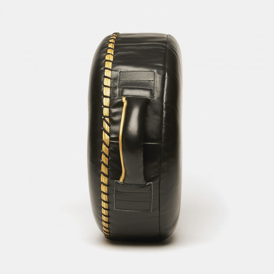 Escudo Redondo Puños León