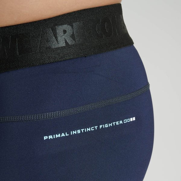 Detail of the Leone writing printed on the blue compression shorts