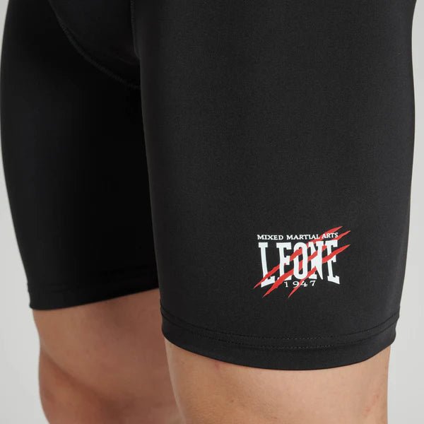 Close-up of the Leone writing on the leg of the black Primal Instinct shorts