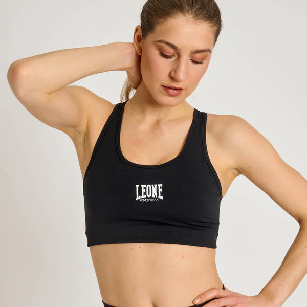 Vista frontale del top sportivo tecnico Leone Logo colore nero con effetto compressivo