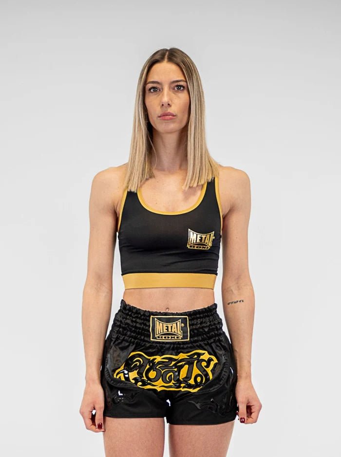 Vista frontal top deportivo Metal Boxing negro y dorado en lycra para entrenamiento