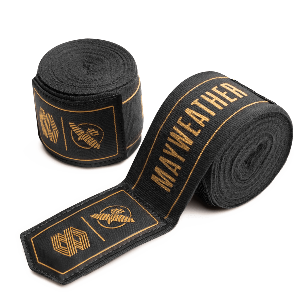 A pair of Mayweather Hayabusa 180 inch Stretch Hand Wraps, black with gold 'MAYWEATHER' logo and lettering, rolled into discs ready for application
