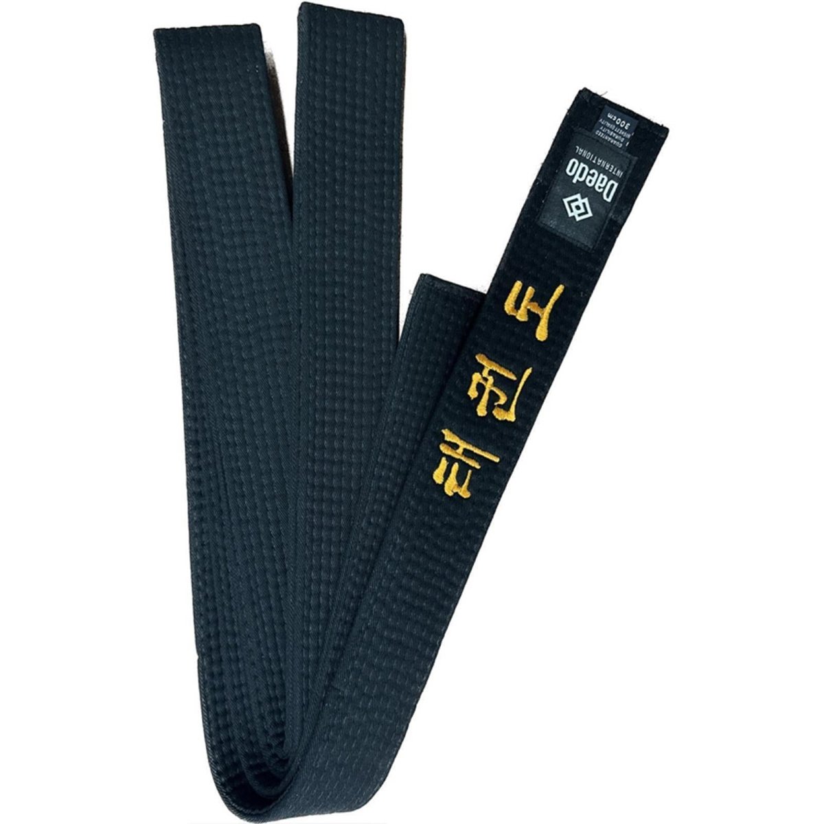 Cinturón Daedo negro de 5 cm con bordado de Taekwondo enrollado para mostrar el grosor y el tejido
