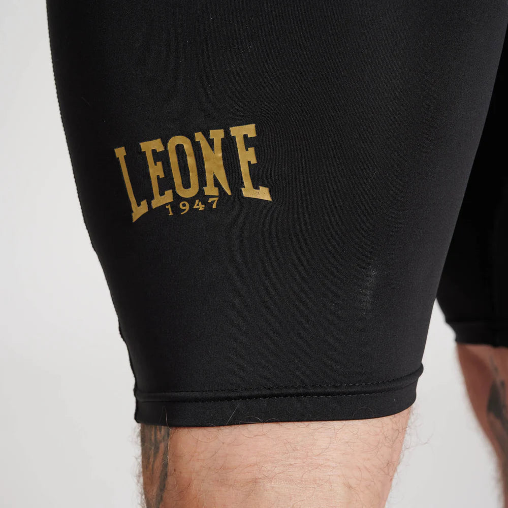 Pantalones cortos de compresión Leone DNA | Pantalones ajustados para entrenamiento negro oro