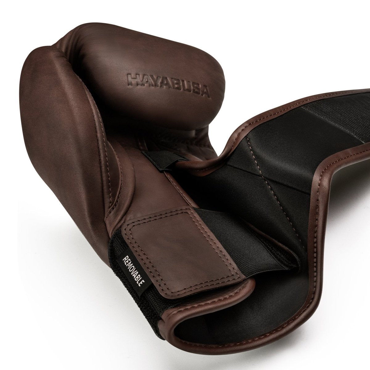 Single view of the brown Hayabusa T360 glove, focus on the Dual-X interlocking closure