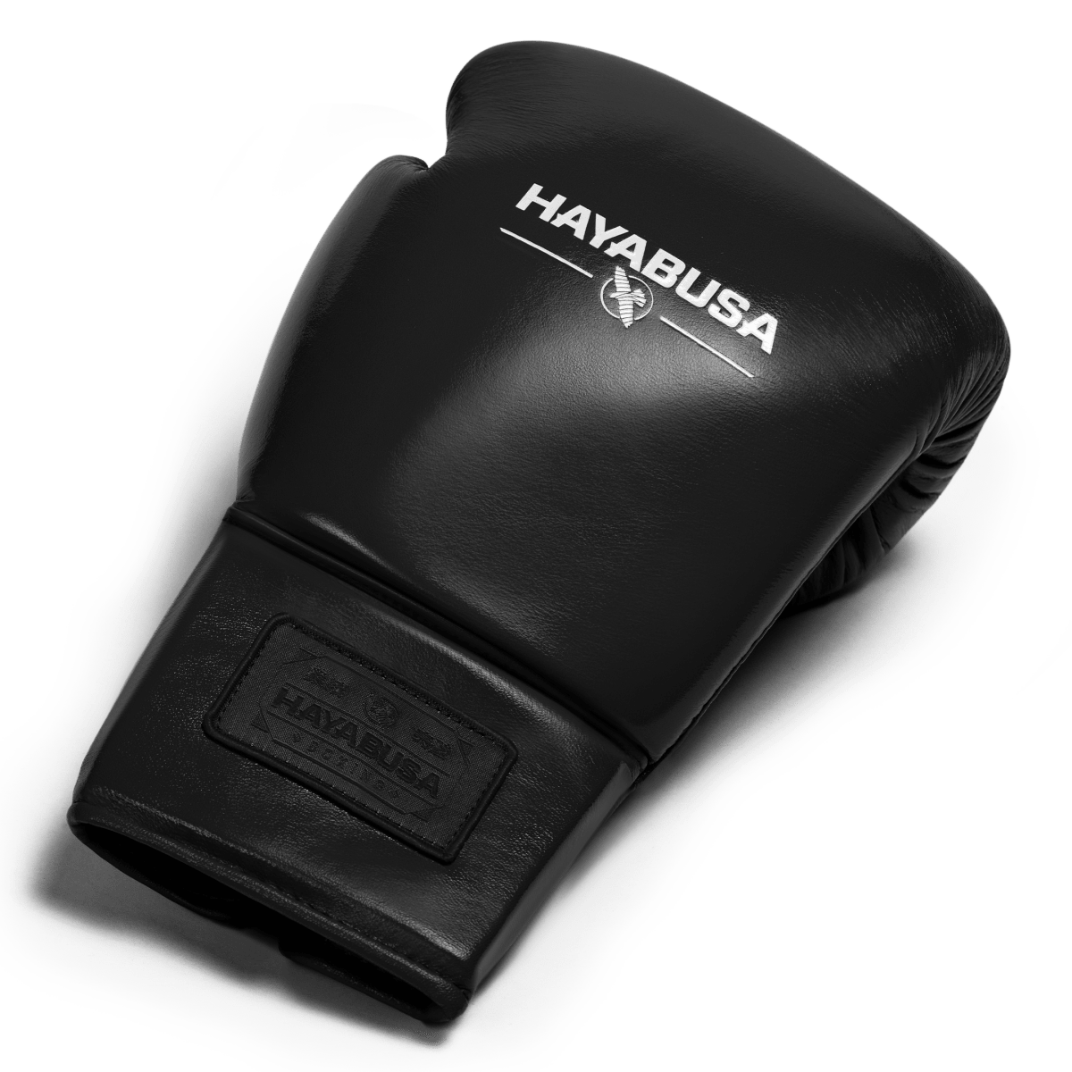 Vista superior de uma única luva de boxe Hayabusa Pro Lace preta, mostrando o acolchoamento e o couro de flor integral