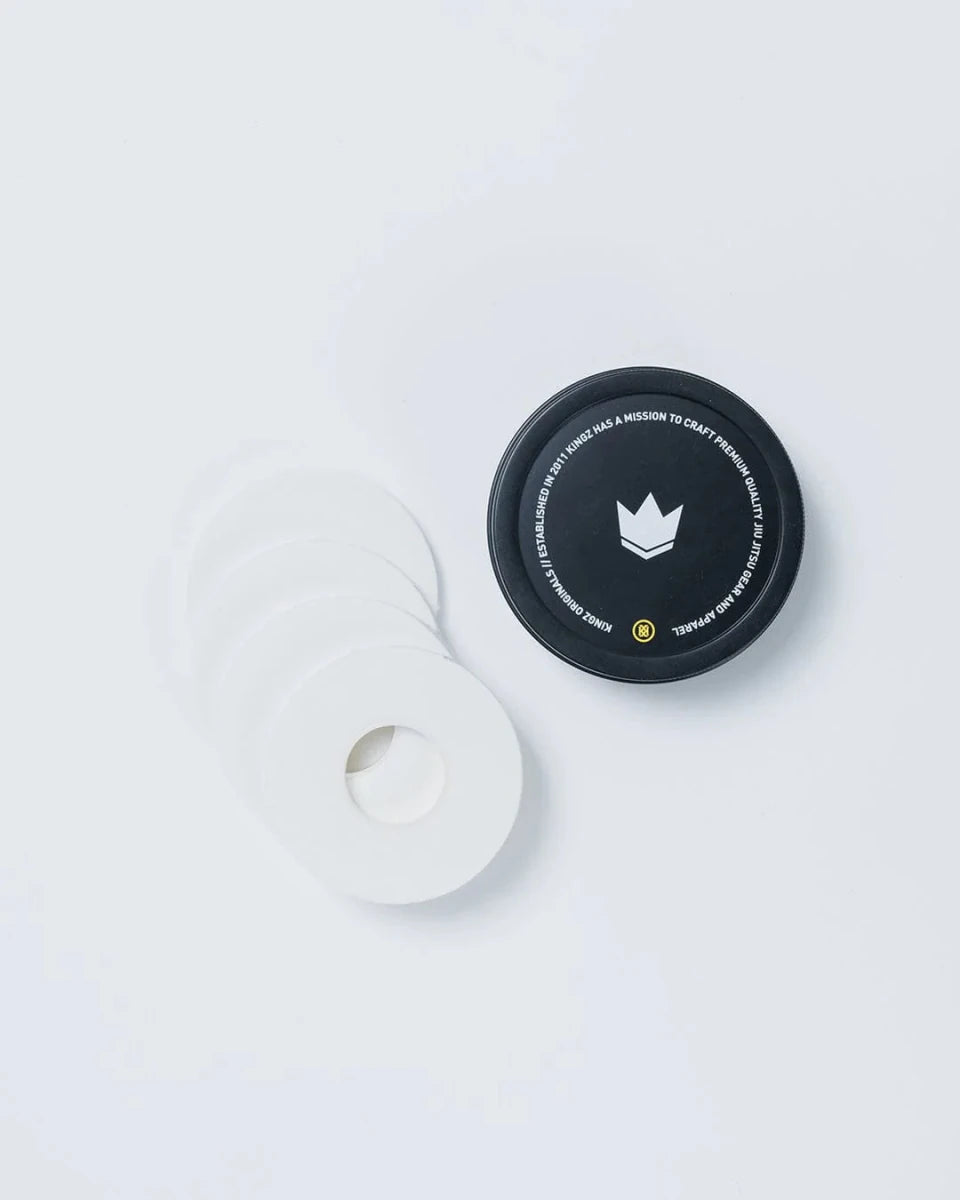 Paket utama Kingz Finger Tape berwarna putih dengan 4 gulungan dan kotak logam
