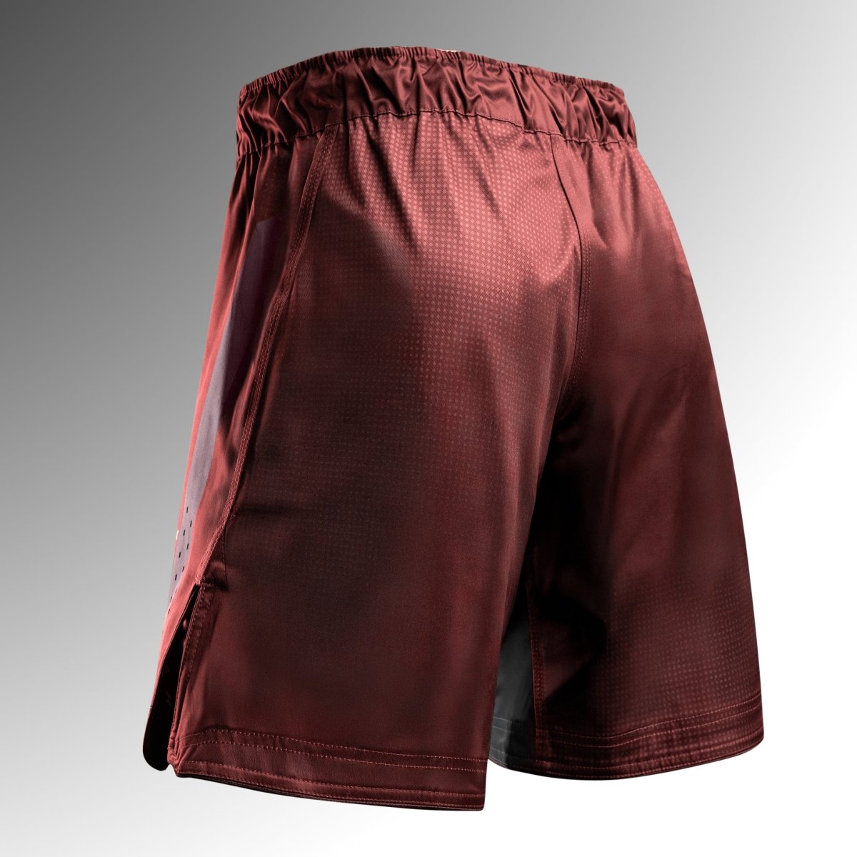 Vista trasera de los pantalones cortos rojos de MMA Hayabusa Core Full-Length, cobertura total para BJJ y MMA