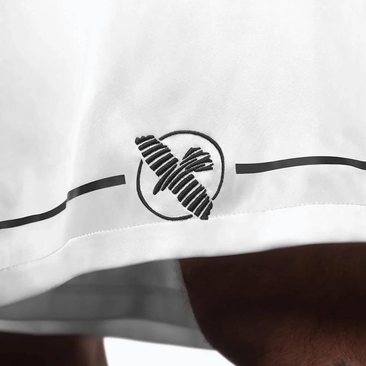 Hayabusa logo embroidered patch on white boxing shorts