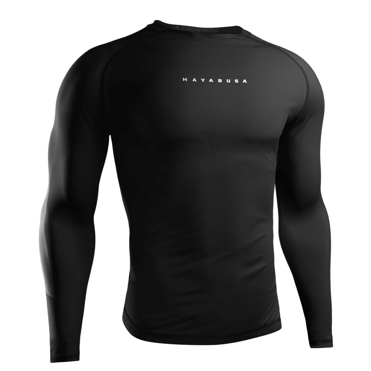 Vista frontal do rashguard preto de manga comprida Hayabusa Core, ajuste de compressão para Jiu-Jitsu e MMA