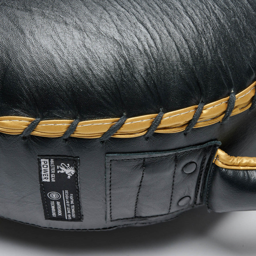 Escudo Redondo Puños León