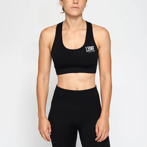 Vista frontale del top seamless nero Leone Logo con sostegno medio
